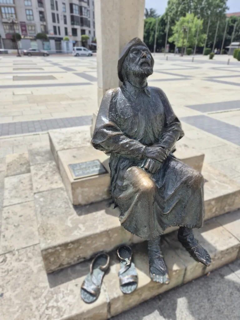 Bronze pilgrim statue in León on the Camino de Santiago