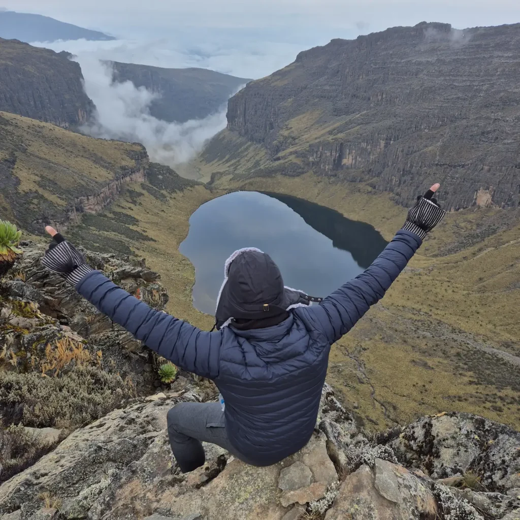 Simon at Mintos overlooking Lake Michaelson on Mount Kenya