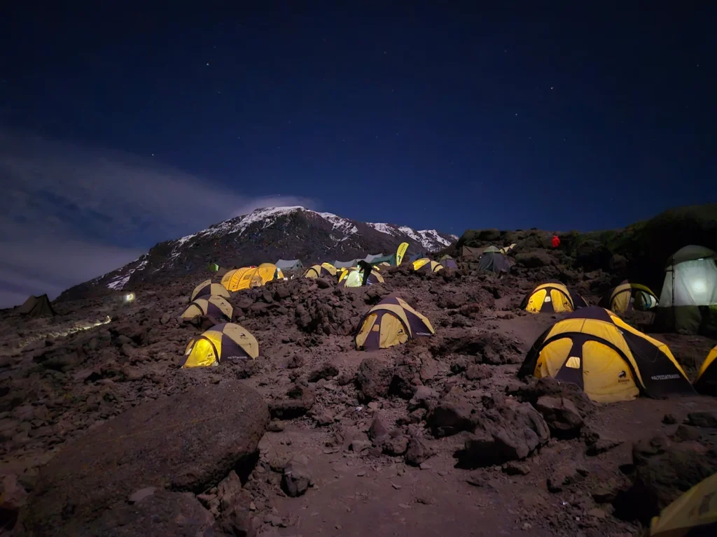 Tents pitched at Barafu Camp at night on Kilimanjaro