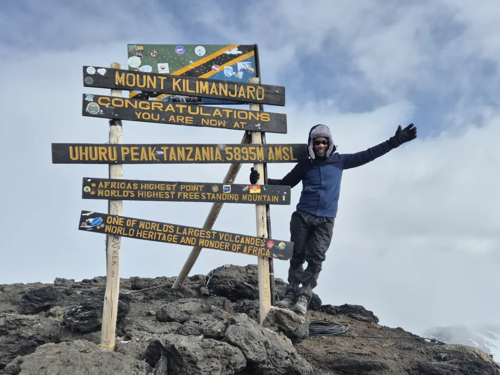 Simon at Uhuru Peak summit on Kilimanjaro