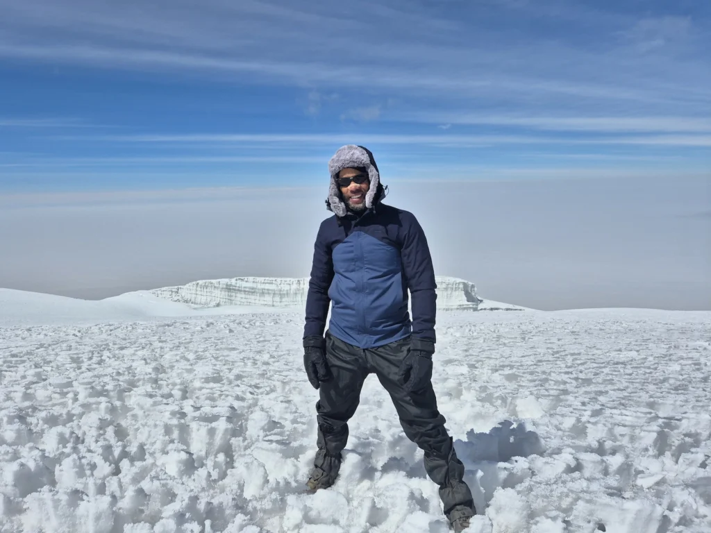 Simon in front of the glacier near Uhuru Peak on Kilimanjaro