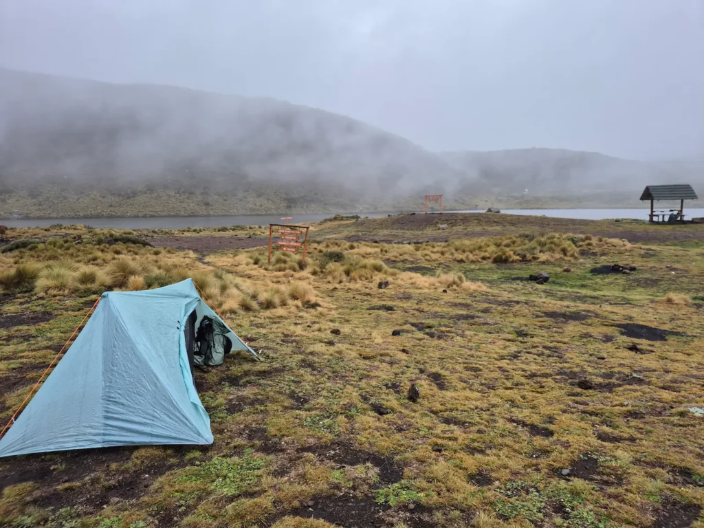 Tent pitched in evening mist at Lake Ellis