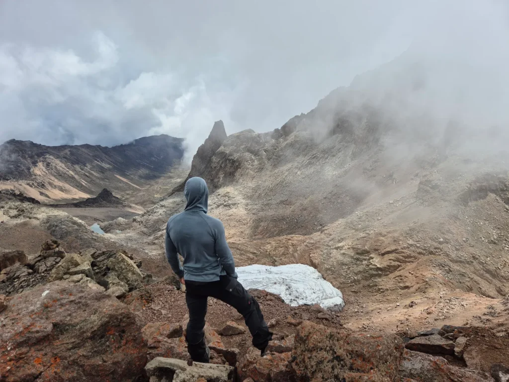 Simon looking down on Lewis Glacier from Point Lenana