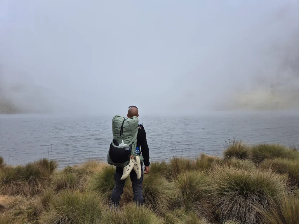 Simon at Lake Michaelson with evening mist over the lake