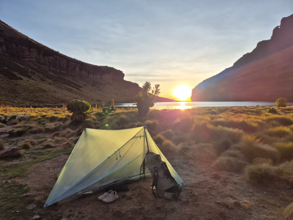 Tent pitched at Lake Michaelson at sunrise