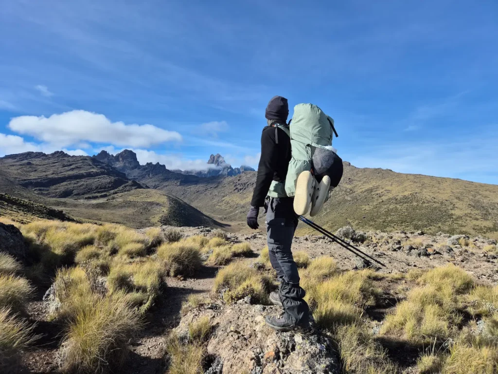 Simon in Liki North Valley with Mount Kenya peaks in the distance