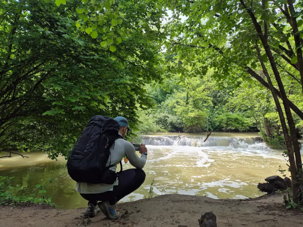 Simon taking a photo of the river in the Upper Val d’Elsa River Park